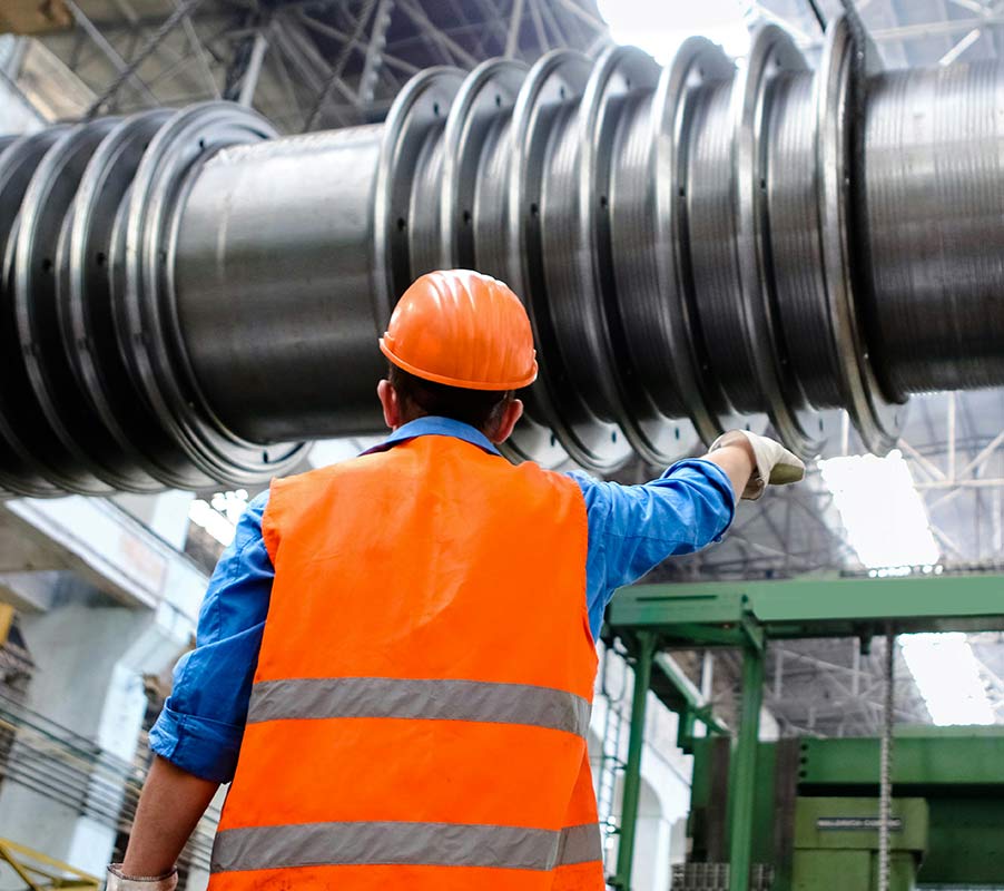 Industrial Worker Inspecting Heavy Machinery Heavy machinery inspection