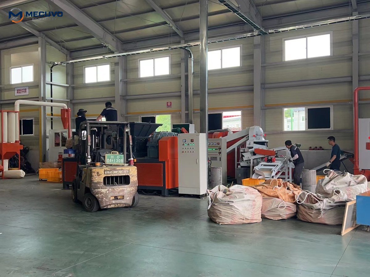 Copper recycling project site with forklift equipment and materials