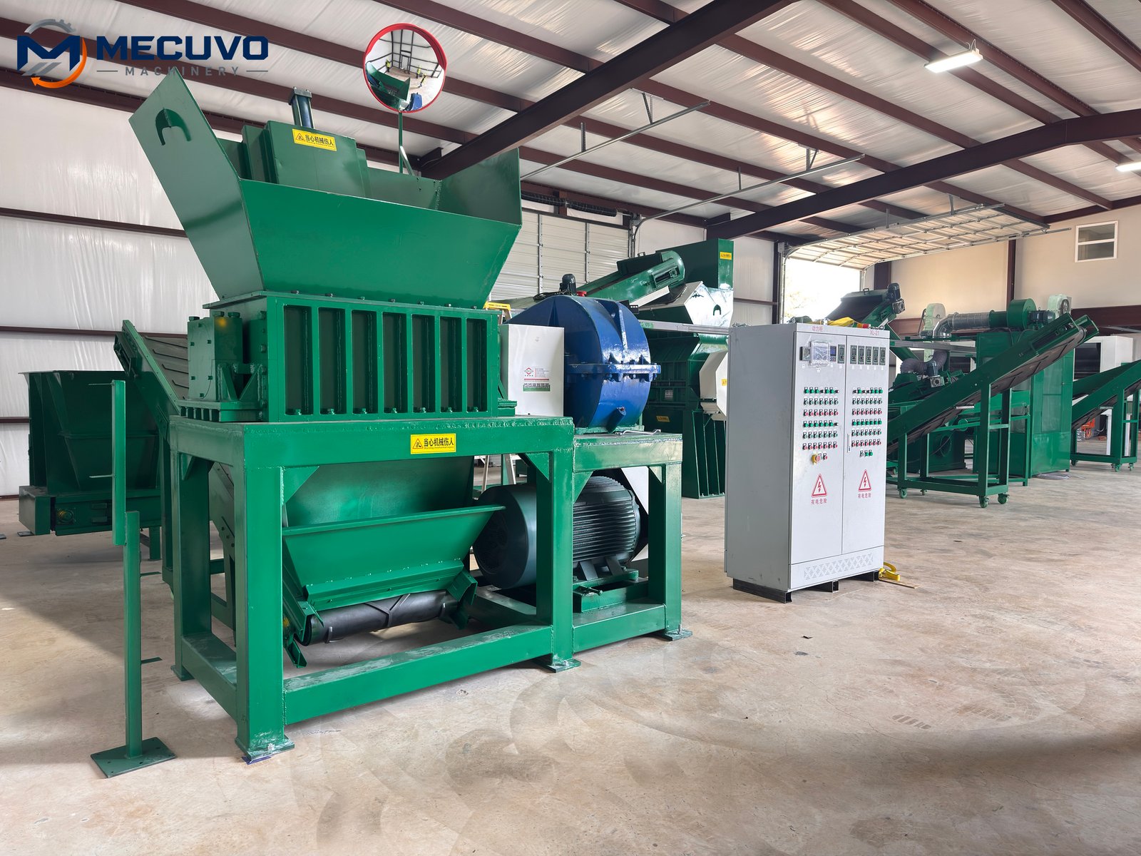 Installed copper recycling equipment and conveyors in a workshop