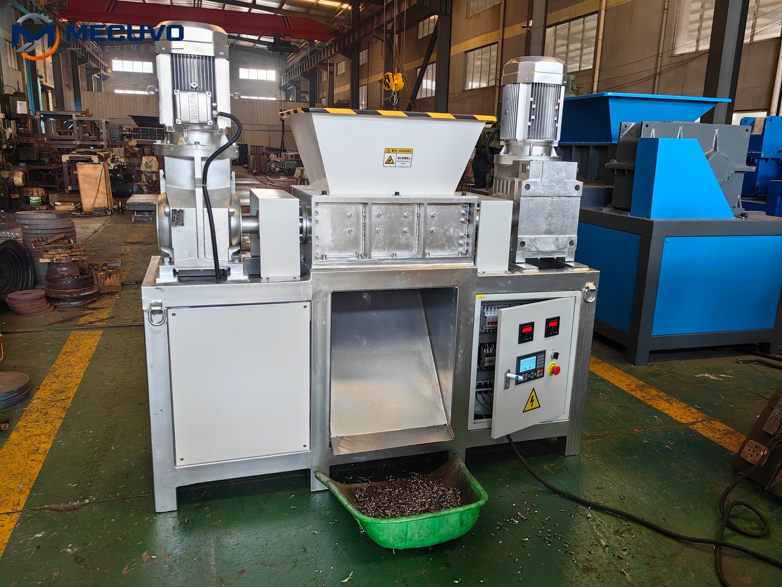 Shredder discharge opening and collection space beneath the machine