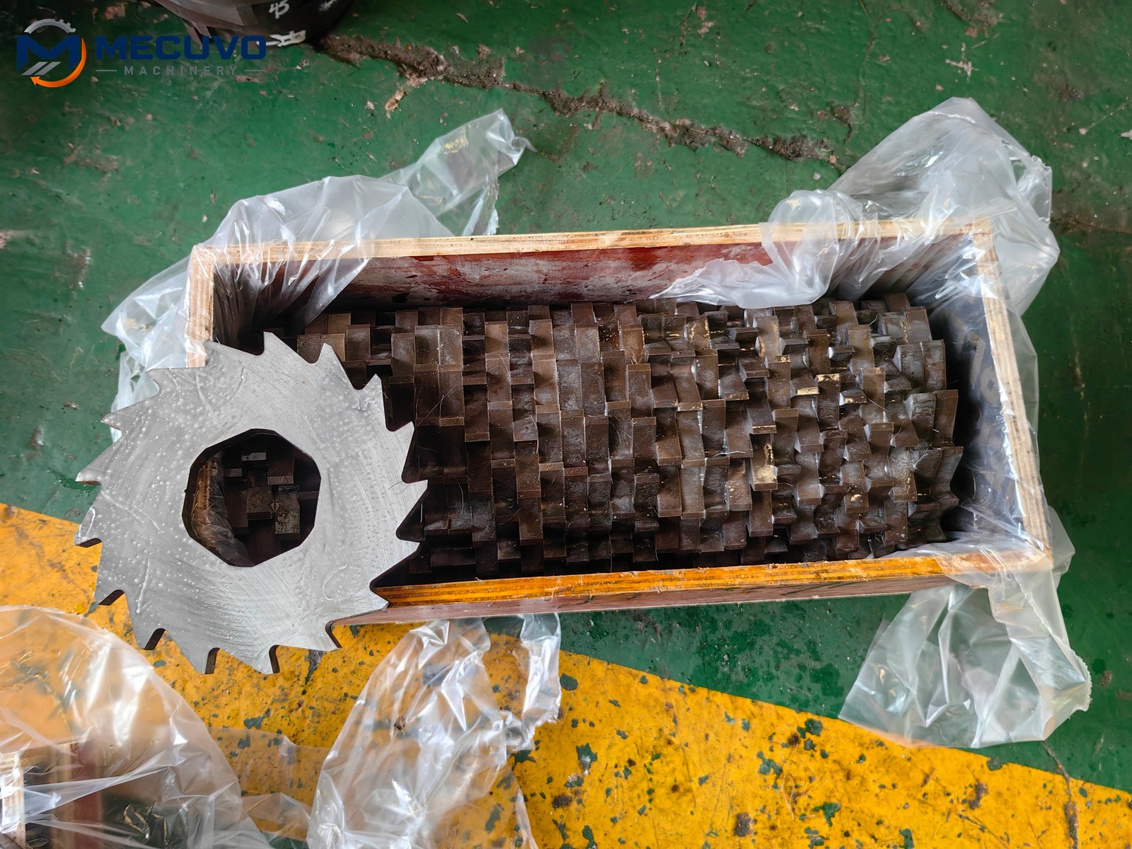 Spare shredder cutter discs stacked and protected in plastic wrapping