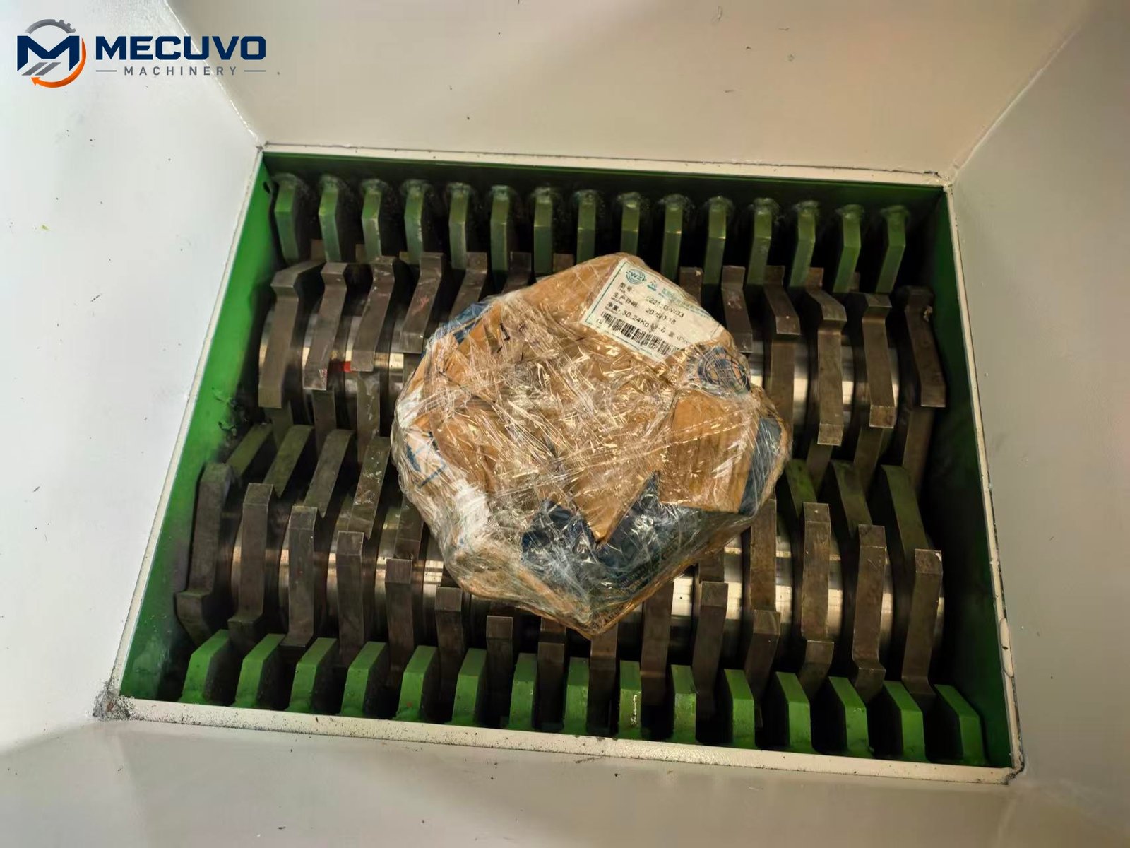 Material positioned inside a shredder cutting chamber