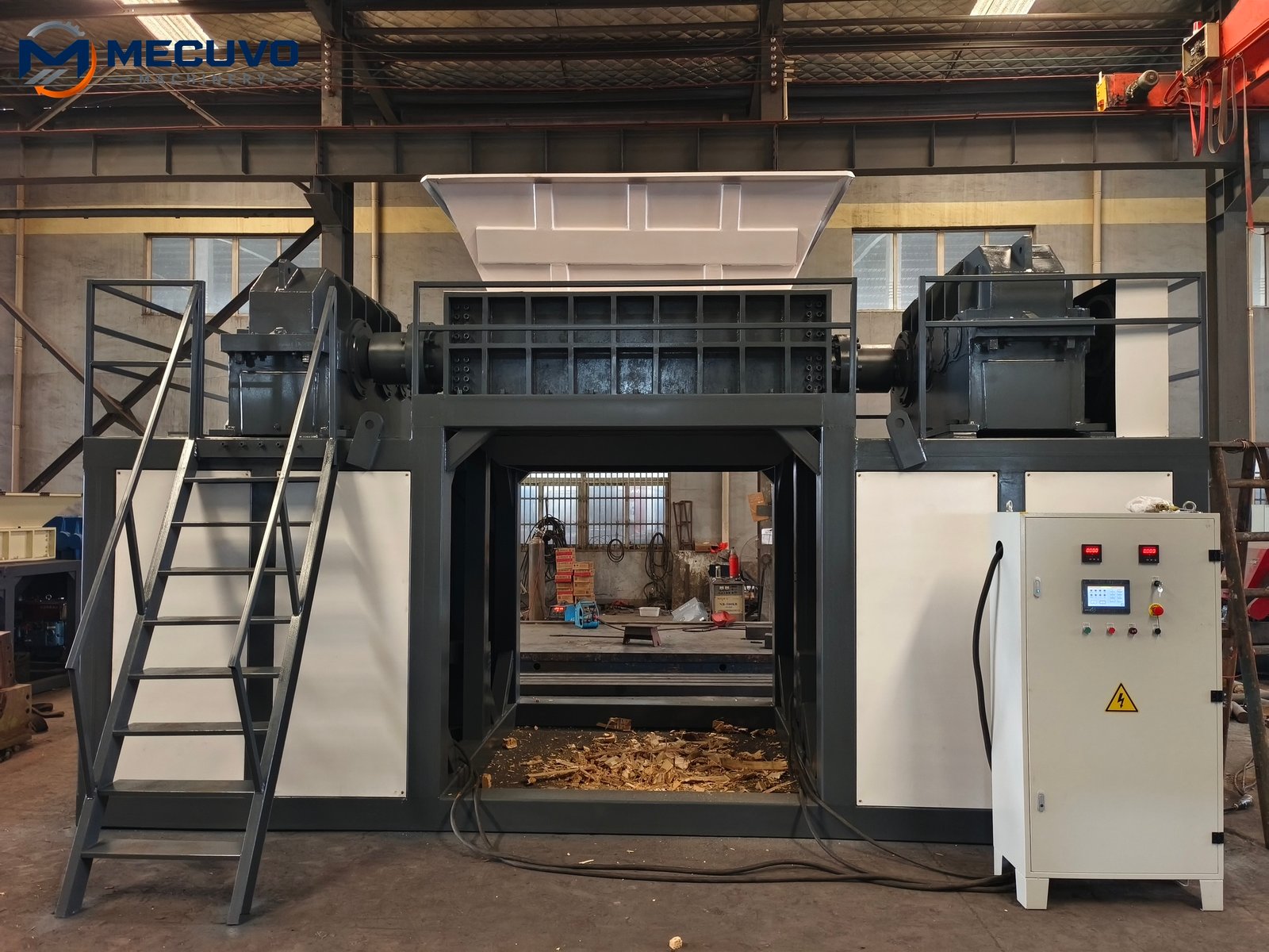 Large dual shaft shredder installed on the factory floor